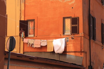 Rome Borgo District Colorful House Facade with Drying Laundry Close Up, Italy