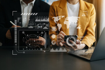 Team colleagues wear formal attire to work together to optimize business processes by using new technologies. high tech hologram in office