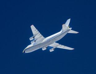 Four engined cargo jet in the sky.