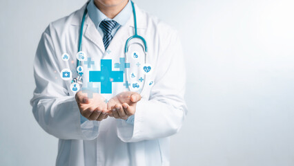 Male medicine doctor hold healthcare medical icons for the Health insurance concept in hospital...