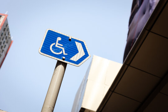 wheelchair sign on the street, blue Traffic Signs in Hong Kong, disability sign