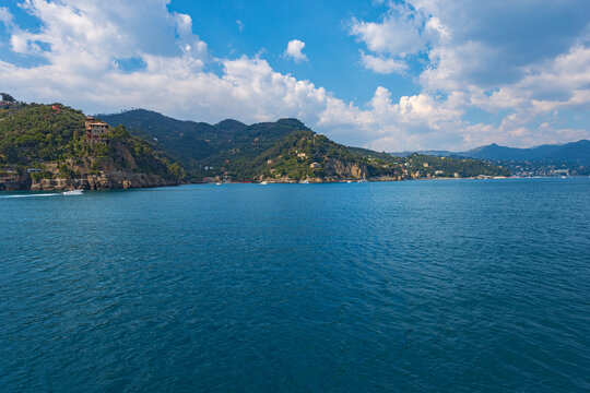 Coast of the famous village of Portofino, with the bay of Paraggi and Santa Margherita Ligure town.Luxury tourist resorts in Genoa Province, Liguria, Italy, Europe.