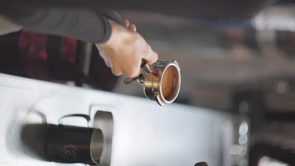VERTICAL, barista prepares and preps coffee making tools in front of crowd