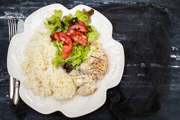 Diet food. Chicken breast with boiled rice and salad. Healthy lifestyle. Sports nutrition.