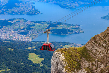 Overhead cable car to the top of Mount Pilatus in Canton Lucerne, Switzerland © olyasolodenko