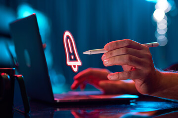 Businessman working on laptop. Digital, holographic icon of notification. Programming. Concept of business, modern technologies, network, digitalization