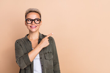 Photo of wear khaki shirt business lady short blonde hairdo direct finger look mockup open her...