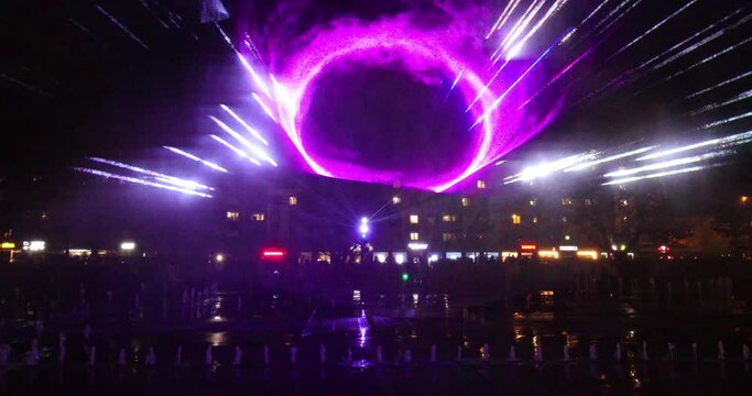 Laser show on the fountain near the Museum of Art in Kaliningrad at night
