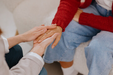 group therapy of couple psychologist moral support and mental health. close up of hands and handshakes at session psychotherapist. women and men care for support each other. depression and addiction
