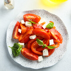 Red pepper salad with tomatoes and feta cheese
