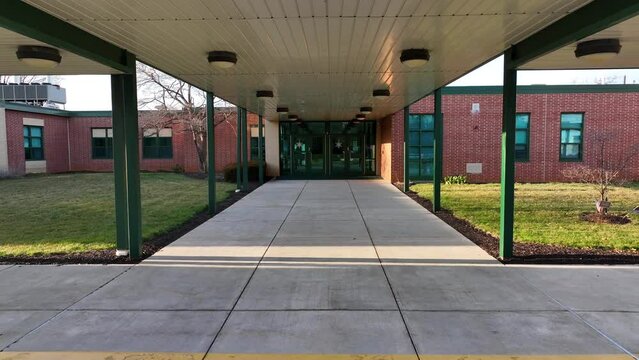 Front entrance of an American elementary school. Aerial view of educational building.
