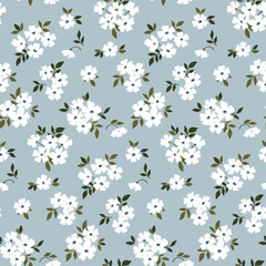 Seamless floral pattern, liberty ditsy print with rustic motif. Romantic botanical design for fabric, paper: hand drawn plants, small white flowers, tiny leaves on blue background. Vector illustration