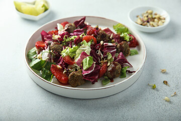 Healthy meatball salad with chickpea