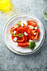 Red pepper salad with tomatoes and feta cheese