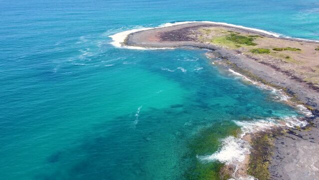 Aerial drone coastline shot of Bawley Point headland South Coast clear ocean reef travel tourism rocky headland landscape scenery NSW Australia 4K