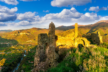 travel landscape of ancient castle on top of a hill or mountain with highland mountain landscape...