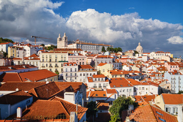 Obraz premium View of Lisbon famous postcard iconic view from Miradouro de Santa Luzia tourist viewpoint over Alfama old city district. Lisbon, Portugal.