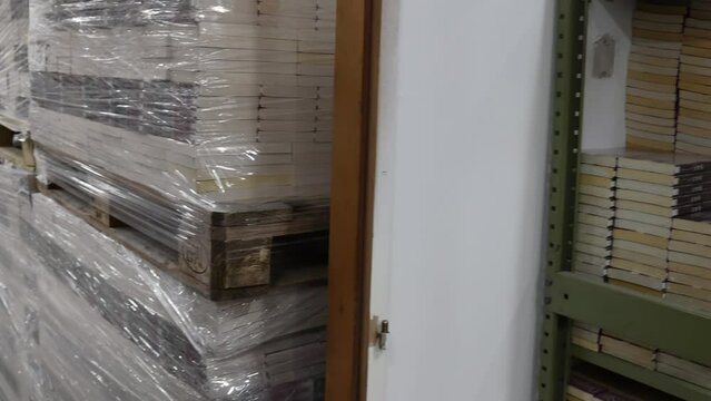 Books and Magazines Printed Media at Pallets in Warehouse Storage Room Panorama