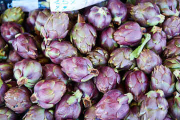 Fototapeta na wymiar Full frame shot of artichokes for sale at vegetable market