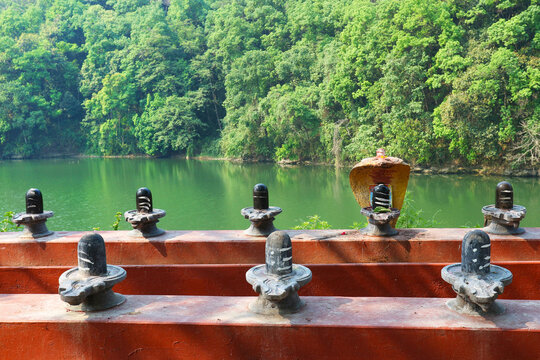 Shiva lingam on the shore of Phewa Lake in Pokhara, Nepal. Kedareshwor Temple.