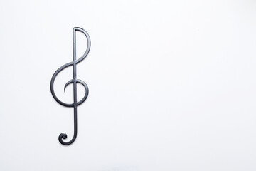 Black treble clef on a white background. Music symbol