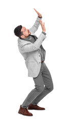 Emotional bearded businessman in suit evading something on white background