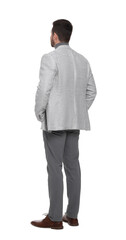Businessman in suit standing on white background