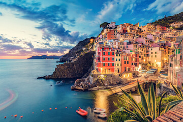 Fototapeta na wymiar Riomaggiore in Cinque Terre, Italy at the evening