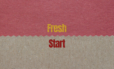 Fresh Start symbol. Torn paper background with Fresh Start text on it.