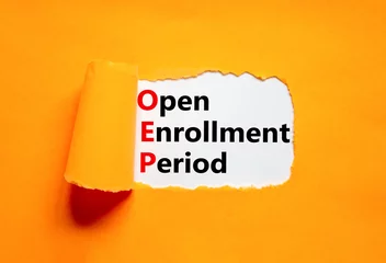 Deurstickers OEP symbol. Concept words OEP Open enrollment period on beautiful white paper. Beautiful orange table orange background. Medical and OEP Open enrollment period concept. Copy space. © Dzmitry