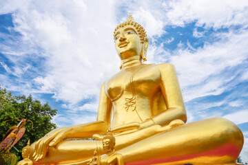 The Golden Big Buddha with blue sky in Pattaya, Thailand in a summer day