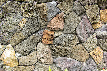 The wall of natural stone
