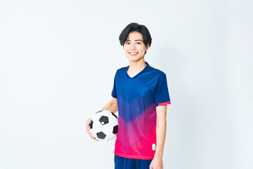 サッカーボールを持つサッカー選手