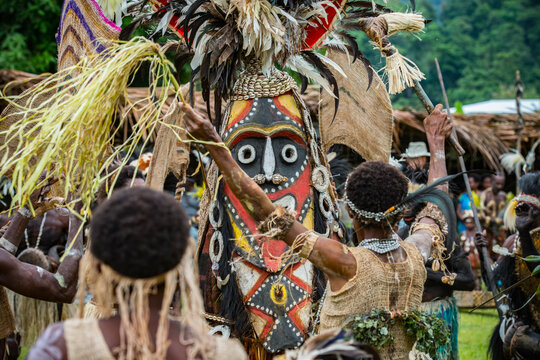 Crocodile festival in Ambunti, Sepik area in Papua New Guinea with crocodils and mask.