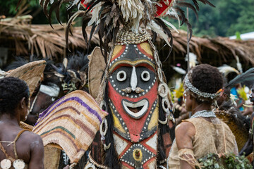 Crocodile festival in Ambunti, Sepik area in Papua New Guinea with crocodils and mask.