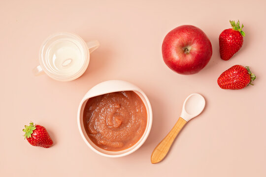 Baby puree recipe made of fresh fruits. First baby solid food recipe idea. Top view,  flat lay