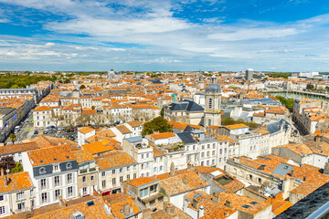 Fototapeta na wymiar Panoramic view of the rooftops of the center of La Rochelle city in France