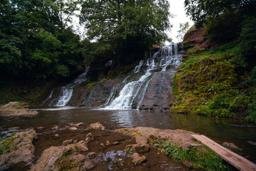 Nature, Chervonogorodsky Falls, Dzhurynsky waterfall in Nyrkiv on the Dzhuryn river. Ternopilska oblast, Ukraine. Tourist place with beautiful views. For recreation and an active lifestyle.