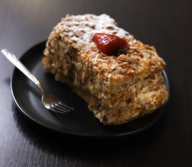 Napoleon puff pastry with cream and strawberries. Shallow depth of field