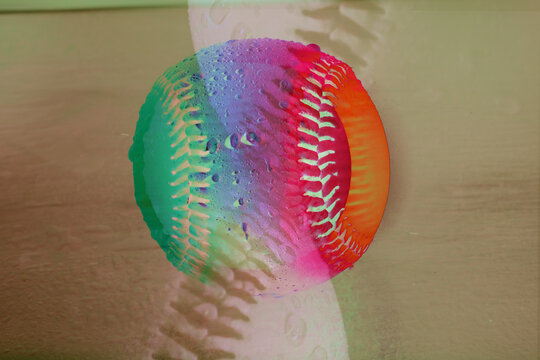 Abstract colorful rainbow color of baseball ball in double exposure sports background.