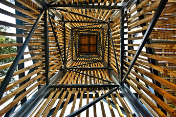Steel and wood structure of the observation tower, Skielek top, Lukowica, Poland.  View from the bottom up.