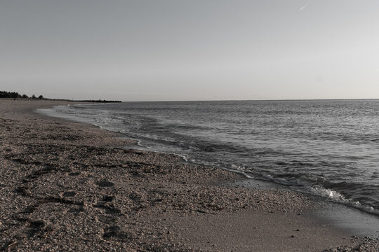 I love this black and white image of the beach. The picture was taken at Sunset beach in Cape May New Jersey. The sand here is beautiful with the waves crashing into the shore.