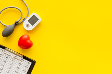 Doctor cardiologist table desk with blood pressure monitor