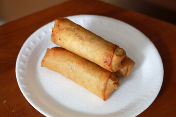 Lumpia or lunpia, traditional snacks from Indonesia. Traditional spring rolls contain stir-fried bamboo shoots, eggs, and chicken or shrimp