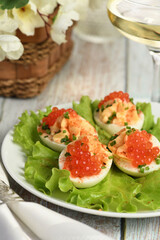 Stuffed eggs with salmon caviar