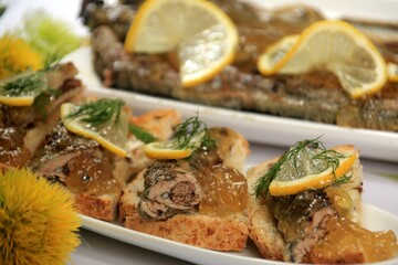 roasted fish river lamprey (lampetra fluviatilis) on a bread