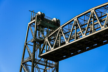 Koningshavenbrug ("King's Haven Bridge") is an industrial-style railway bridge across the Nieuwe Maas in Rotterdam, the Netherlands. The central part of this bridge is raised thanks to a pulley system