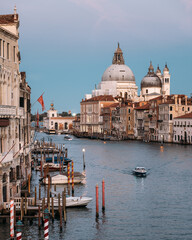 Fototapeta na wymiar Scenic view of the Salute Roman Catholic church and minor basilica located in Punta della Dogana in the Dorsoduro sestiere of the city of Venice Italy on a cloudless summer evening. Copyspace