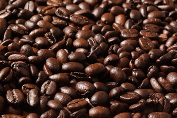 MACRO PHOTOGRAPHY OF ROASTED COFFEE BEANS. FOOD CONCEPT.