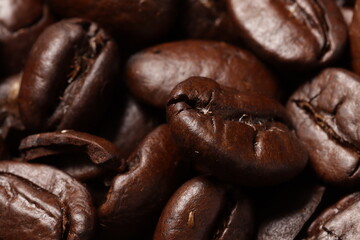 MACRO PHOTOGRAPHY OF ROASTED COFFEE BEANS. FOOD CONCEPT.